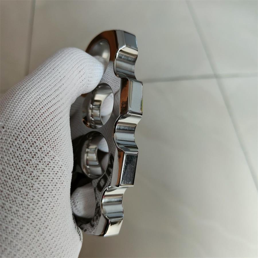 Polished Titanium Knuckle Duster with Sleek Reflective Surface